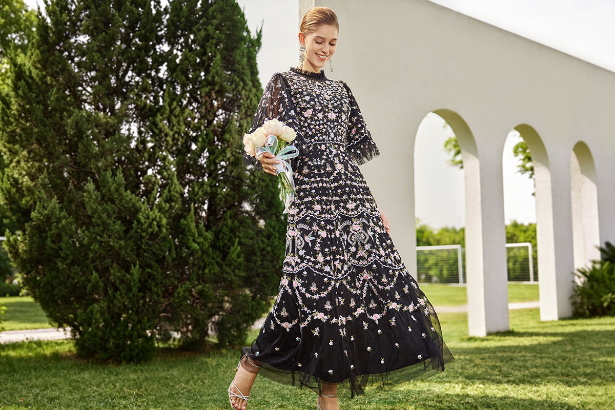 richradiqs black floral embroidered maxi dress for a formal garden engagement shoot