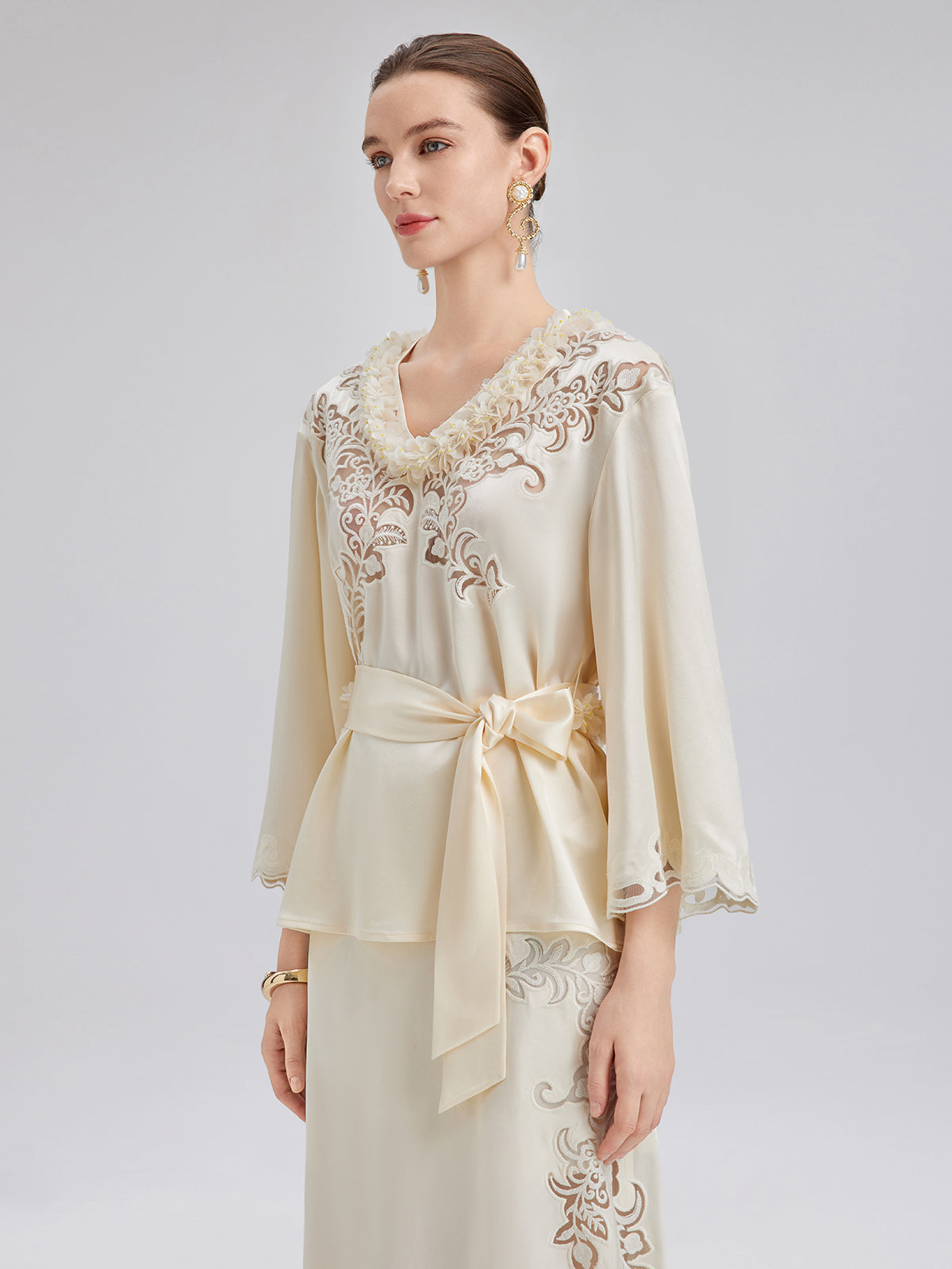 Embroidered Cutout Minimalist Long-Sleeve Top